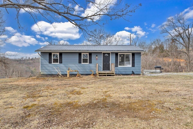 view of front of property with metal roof