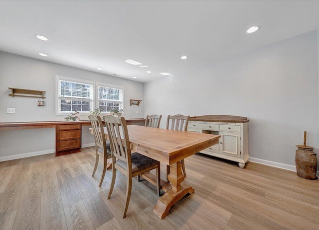 dining room featuring recessed lighting, light wood-style flooring, and baseboards