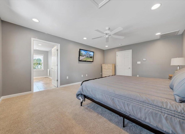 bedroom with light carpet, baseboards, visible vents, and recessed lighting