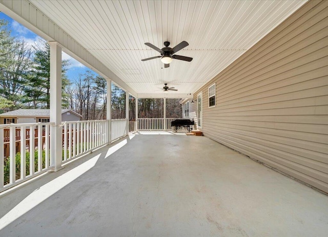 view of patio with ceiling fan