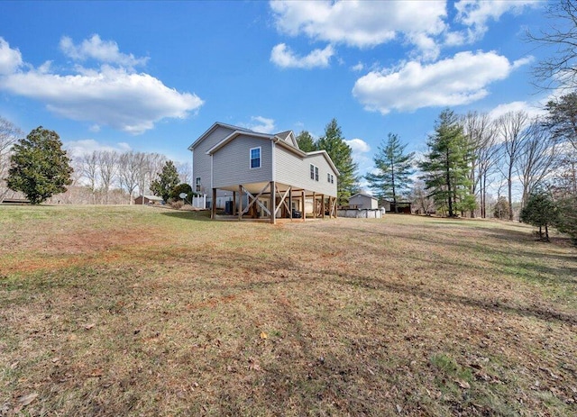 view of home's exterior with a yard