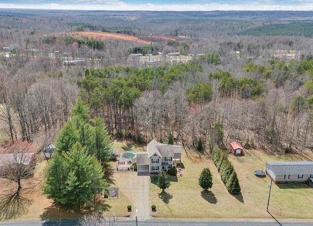 bird's eye view featuring a view of trees