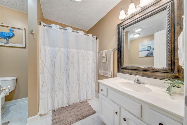 full bathroom with vanity, a shower with curtain, tile patterned flooring, a textured ceiling, and toilet