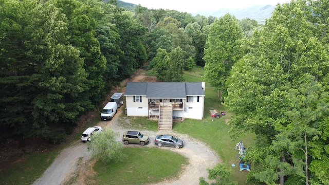 aerial view featuring a forest view