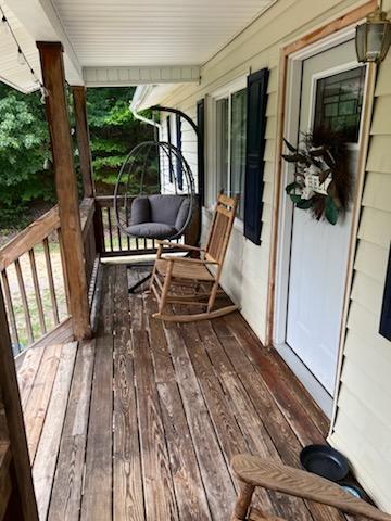 wooden terrace with covered porch