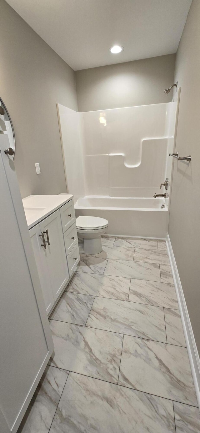 216 Franklin Ave, Vinton, VA 24179 - bathroom featuring marble look tiles, vanity, shower / bathtub combination, and recessed lighting