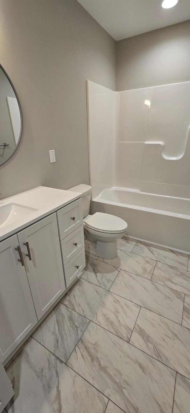 216 Franklin Ave, Vinton, VA 24179 - bathroom featuring vanity, marble look tile flooring, and bathtub / shower combination
