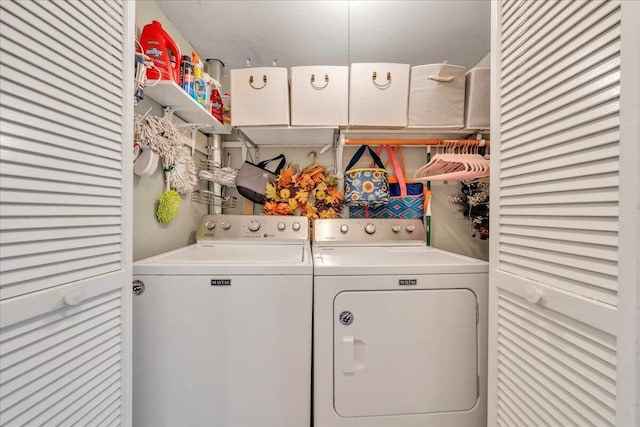 laundry area with laundry area and independent washer and dryer