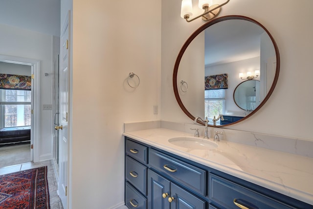 bathroom with a wealth of natural light and vanity