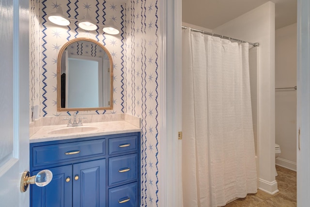 full bathroom with wallpapered walls, toilet, a shower with shower curtain, tile patterned floors, and vanity