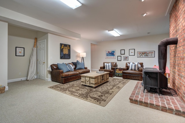 carpeted living room with baseboards and a wood stove