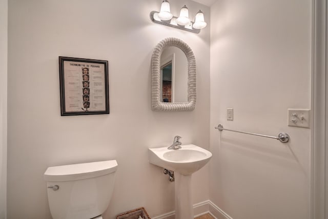 bathroom featuring toilet