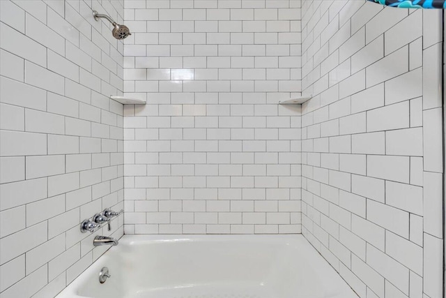 full bath featuring shower / bathtub combination