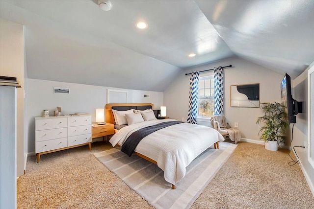 bedroom featuring baseboards, carpet, vaulted ceiling, and visible vents