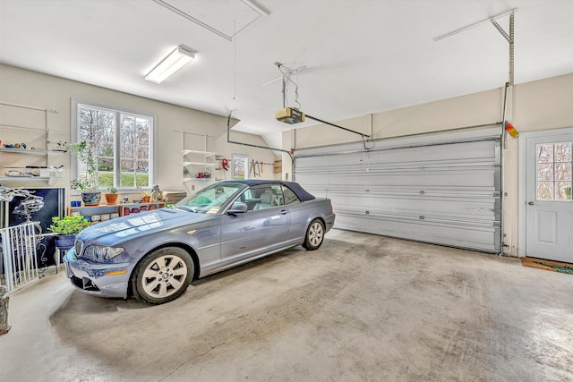 garage featuring a garage door opener