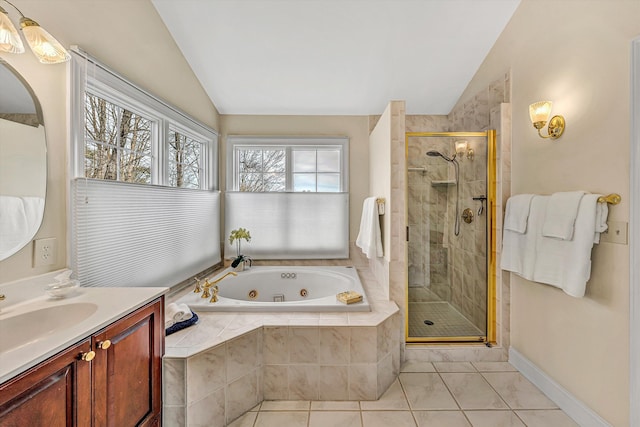 full bathroom with tile patterned floors, a jetted tub, a shower stall, and vaulted ceiling