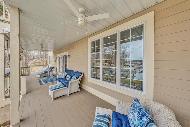 deck featuring a ceiling fan