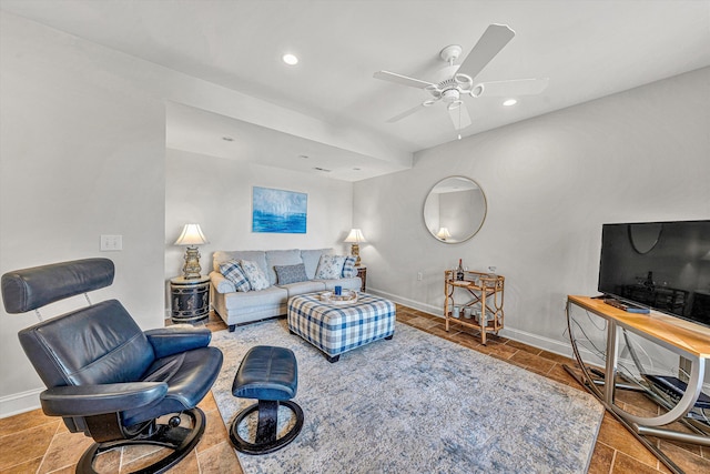 living room with ceiling fan, baseboards, and recessed lighting