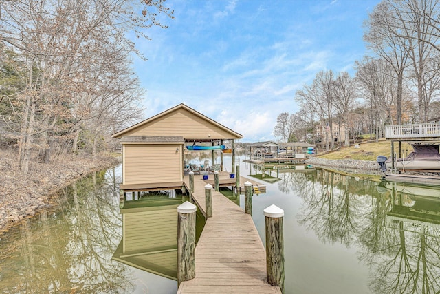 view of dock with a water view and boat lift