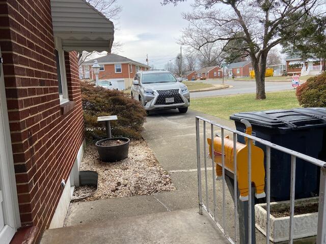 view of yard featuring a residential view