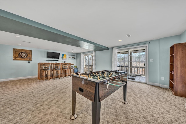 rec room with visible vents, baseboards, a dry bar, carpet flooring, and recessed lighting