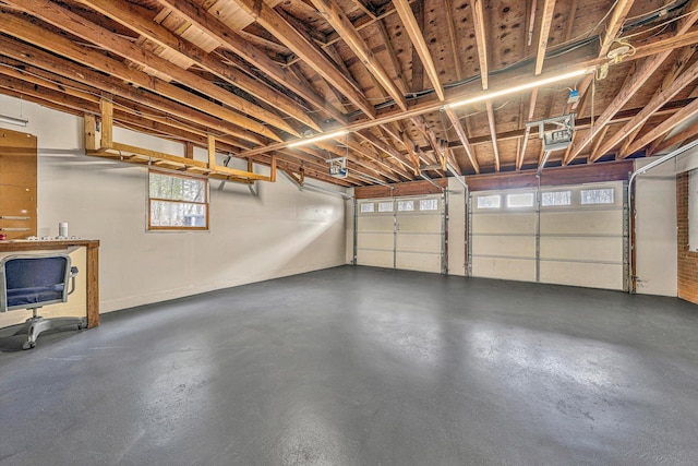 garage featuring a garage door opener