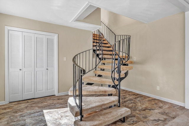 staircase with baseboards