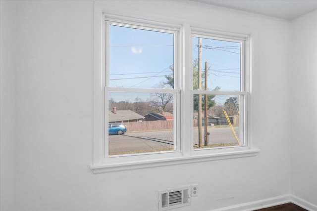 room details featuring visible vents and baseboards