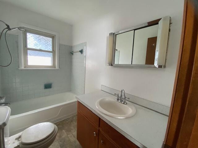 full bathroom with vanity, toilet, and bathtub / shower combination