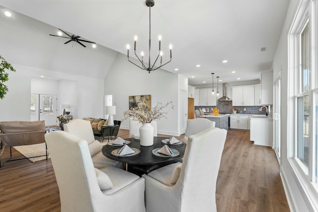 dining area featuring recessed lighting, baseboards, wood finished floors, and a ceiling fan