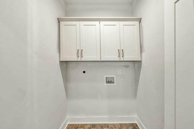 laundry room featuring hookup for a washing machine, electric dryer hookup, baseboards, and wood finished floors