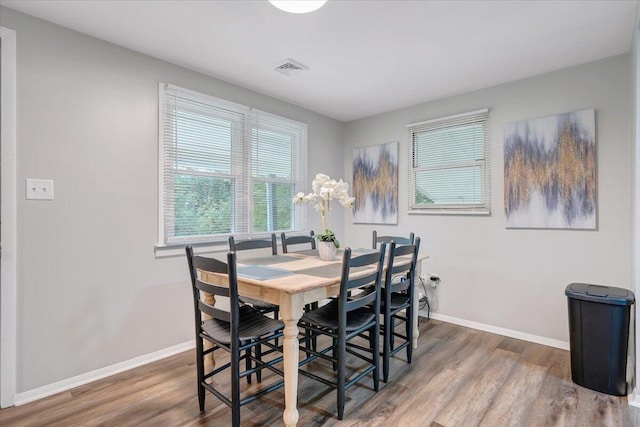 39 Daisy Hill Ln, Rocky Mount, VA 24151 - dining area featuring visible vents, baseboards, and wood finished floors