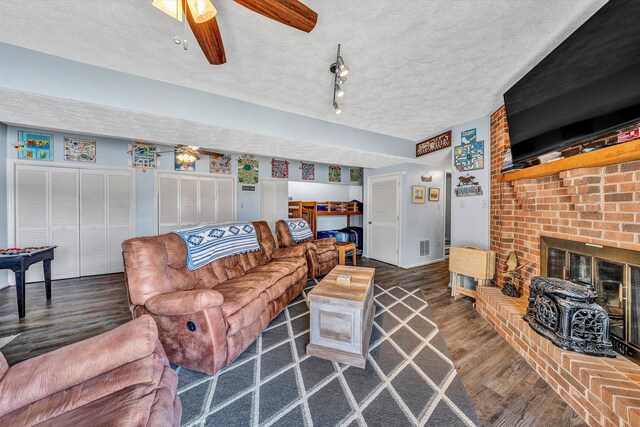 bedroom featuring visible vents, a ceiling fan, baseboards, and carpet floors