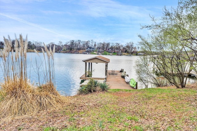 view of dock featuring a water view and boat lift