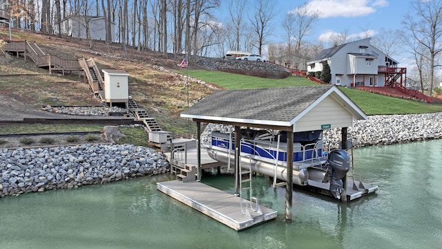 dock area featuring a water view, boat lift, stairs, and a lawn