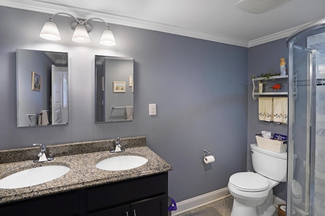 full bathroom featuring crown molding, toilet, a stall shower, and a sink