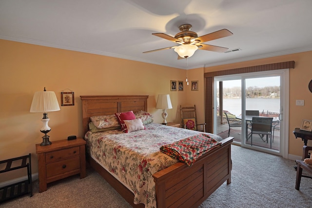 bedroom featuring visible vents, a water view, ornamental molding, light colored carpet, and access to exterior