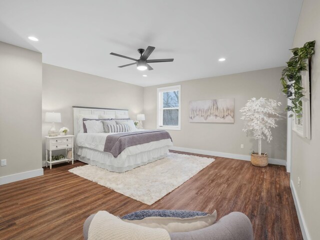 bedroom featuring recessed lighting, baseboards, and wood finished floors