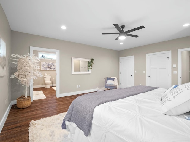 bedroom featuring recessed lighting, baseboards, dark wood-style flooring, and connected bathroom