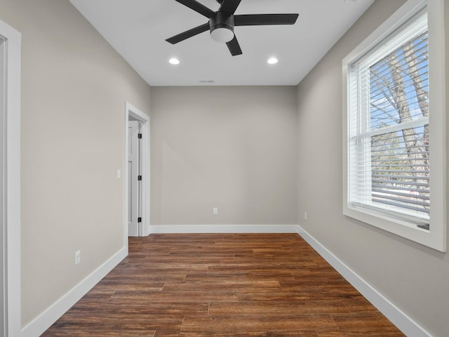 unfurnished room with recessed lighting, ceiling fan, baseboards, and dark wood-style flooring