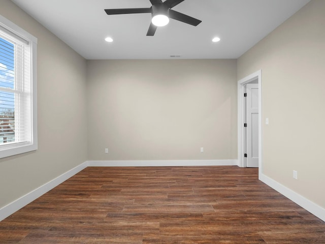 unfurnished room featuring visible vents, dark wood finished floors, recessed lighting, baseboards, and ceiling fan