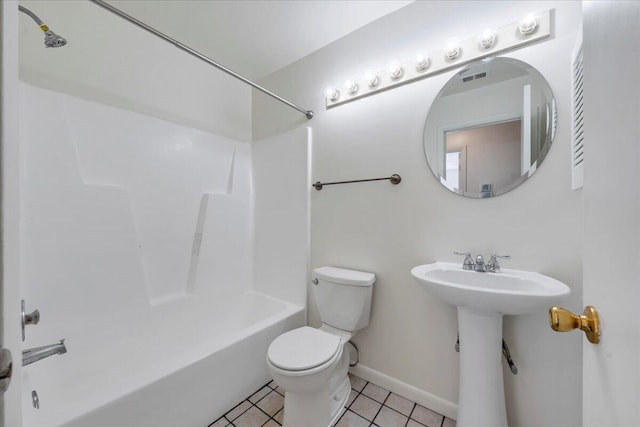 full bathroom with washtub / shower combination, baseboards, visible vents, tile patterned floors, and toilet