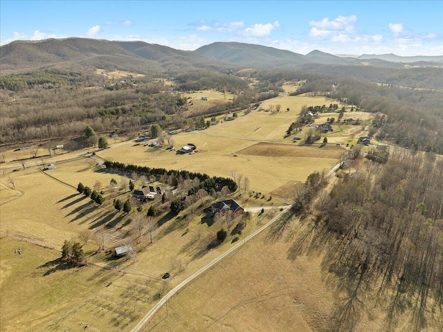 aerial view with a mountain view and a rural view