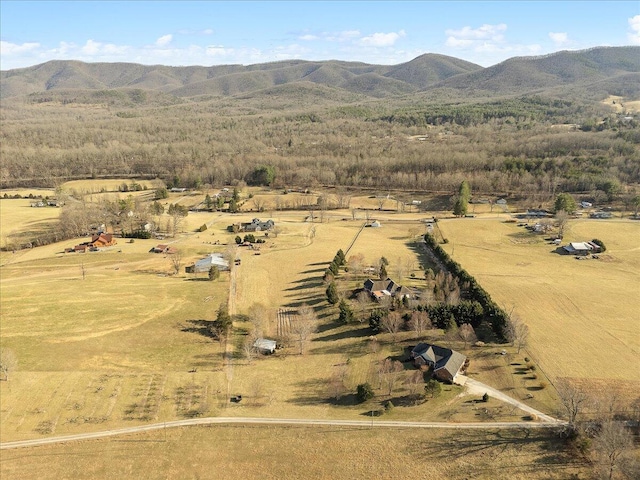 drone / aerial view featuring a rural view and a mountain view