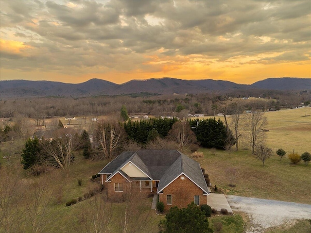 aerial view at dusk with a mountain view