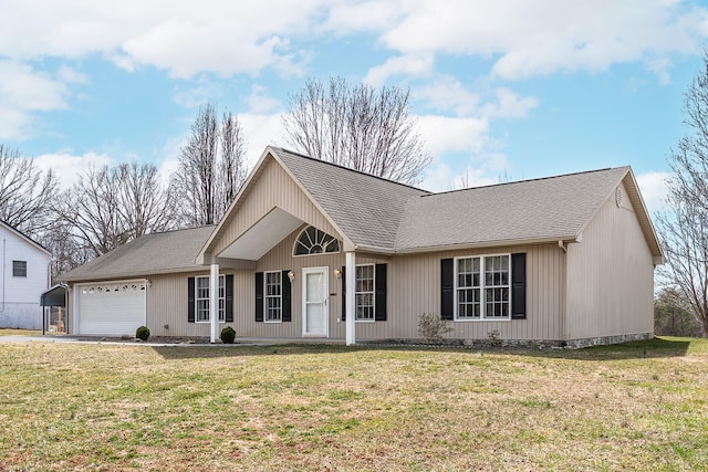 view of front of house featuring driveway, a front lawn, a garage, and roof with shingles