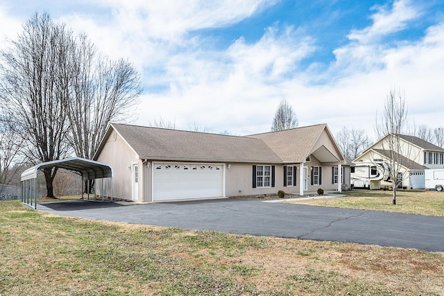 single story home featuring a detached carport, a shingled roof, a front yard, a garage, and driveway