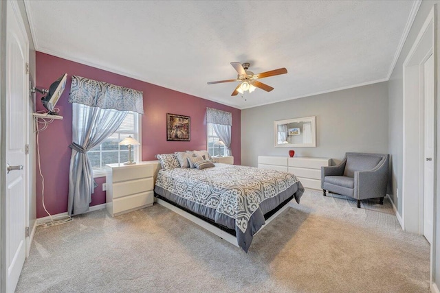 bedroom with multiple windows, light colored carpet, baseboards, and ornamental molding