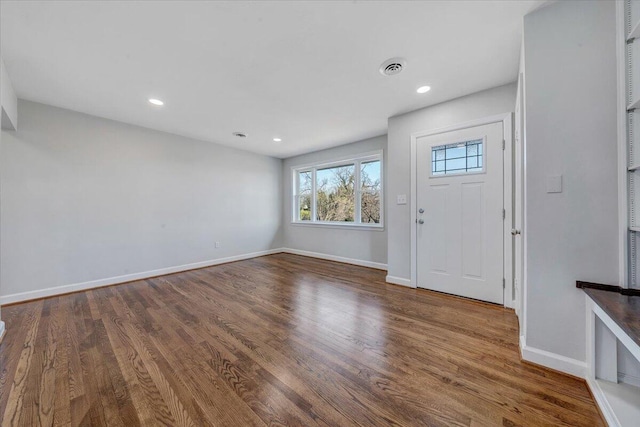 foyer with visible vents, recessed lighting, baseboards, and wood finished floors