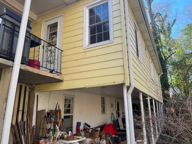 view of property exterior featuring a balcony